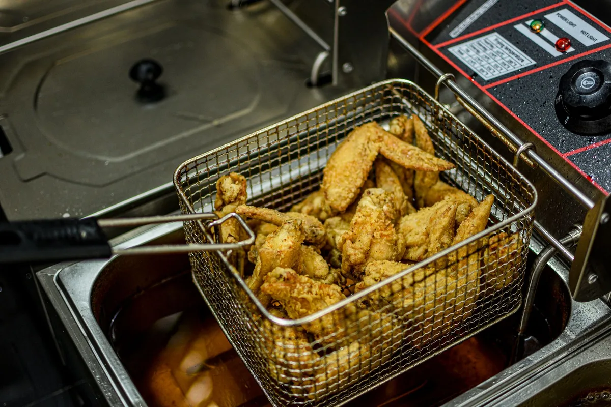 single layer chicken tenders in air fryer basket